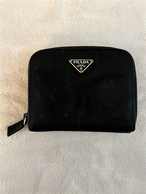 prada nylon zipper wallet.